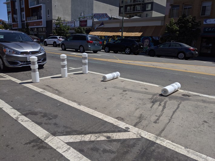 These bollards are going to prevent the resumption of First Fridays, according to the KONO CBD. Photo: Streetsblog/Rudick