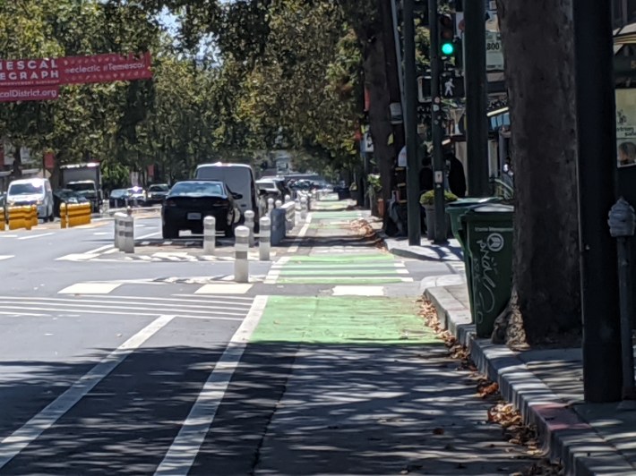 Telegraph in Temescal, one of the two sections where protected bike lanes prevailed. Looking south. Photo: Streetsblog/Rudick