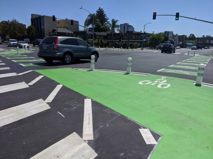 At MacArthur, cyclists don't have to jog for position with right-turning motorists. Photo: Streetsblog/Rudick
