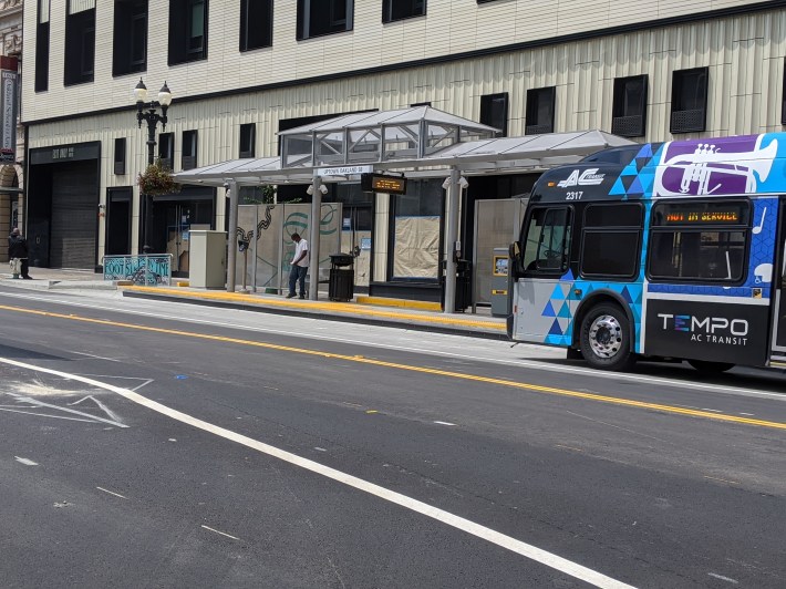 A look at one of the pre-paid platforms, with a Tempo bus heading for International. Photo: Streetsblog/Rudick