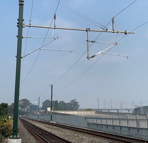 There's actually some wire up now over Caltrain's mainline in Burlingame! Photo: Caltrain