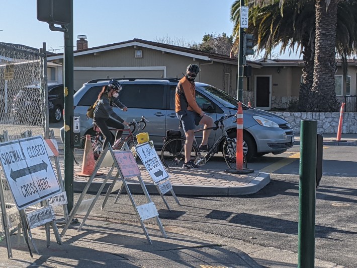 For now, most cyclists continued to go straight through the intersection. When striping is added and construction equipment removed, that will change