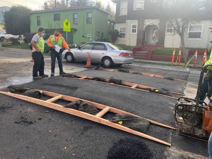 An Oakland crew installing a speed cushion. Photo: OakDOT