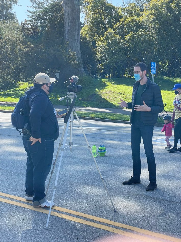 Senator Scott Wiener doing a TV interview supporting car-free JFK