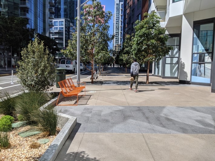 Wide sidewalks encourage people to linger
