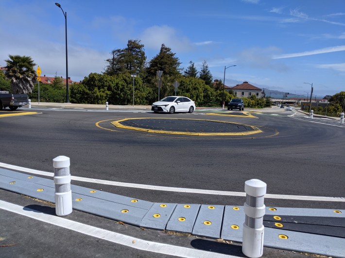 The constrained spaces of the traffic circle definitely seemed to reduce traffic speeds