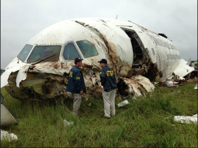 NTSB investigators examining the scene of the UPS Flight 1354 crash in 2013. Photo: NTSB