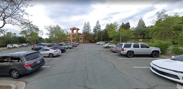 The Contra Costa DA's office is located in a suburban style office park, surrounded by a giant parking lot. Image: Google Streetview