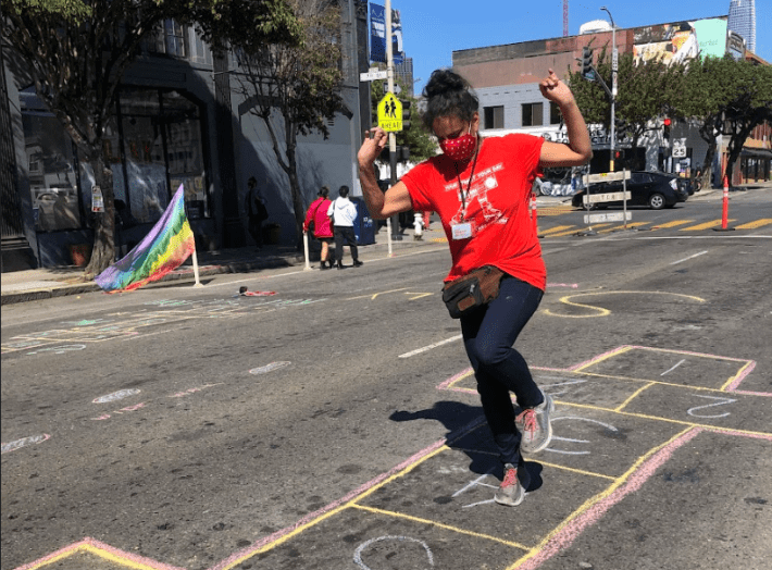 Katy Birnbaum playing hopscotch during SoMa’s Slow Streets.| Photo courtesy of Livable City