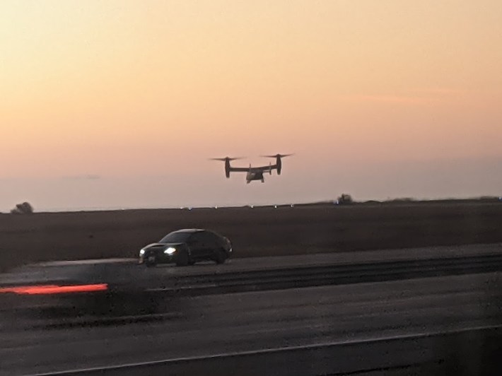 A view of a Navy VTOL aircraft landing from Amtrak. Photo: Streetsblog/Rudick