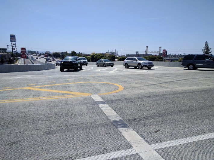 Caltrans's idea of a "complete street"... yes, there's a bike lane in there somewhere. Photo: Streetsblog/Rudick