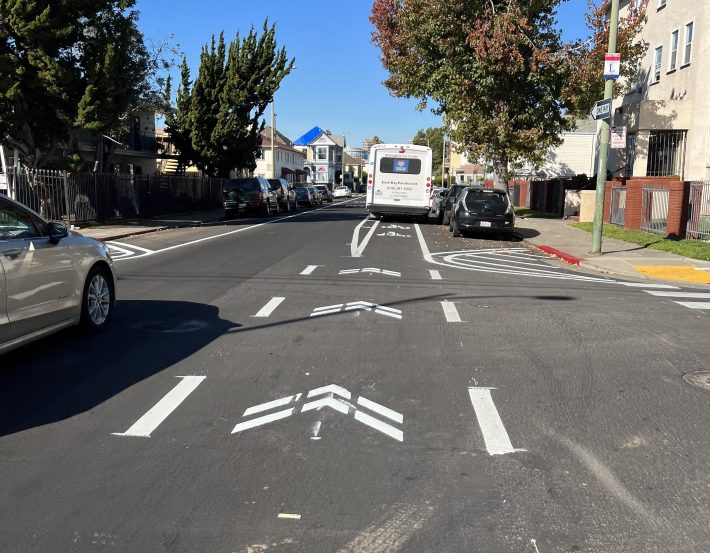 Paint is not protection. A paratransit bus blocking the brand new buffered bicycle lane on Foothill Blvd and 7th Ave.