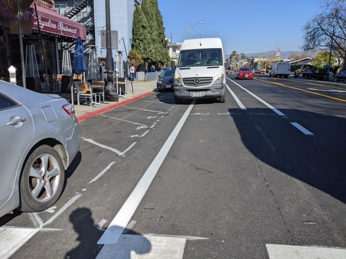 A truck parked on the newly installed buffered, unprotected bike lane on Telegraph. Photos: Streetsblog/Rudick