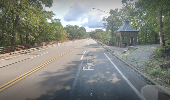 The view of the bridge from opposite the direction I was travelling. My car came to rest near the stone structure on the right (the pole has since been removed). Photo: Google maps