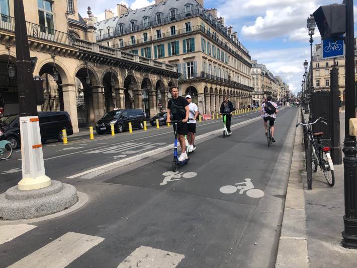 New protected bike lane on the Rue de Rivoli in Paris. Photo: Marcel Moran