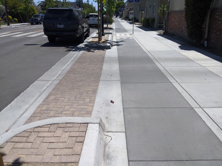 Believe it or not, this is a driveway. Note the curb and continuation of the median and bike lane.