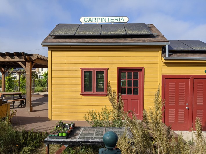 The cut-as-a-button old train station (now part of a community garden) in Carpinteria.