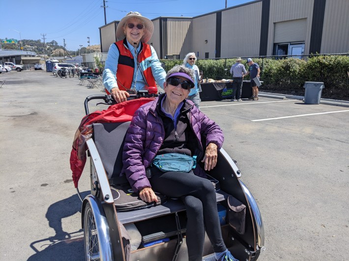 Cheryl Longinotti and Jean Severinghaus with "Cycling without Age" at the ceremony.