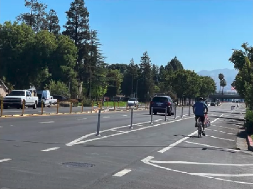 Paint and plastic posts in San Jose. Note the cyclist has sense enough to stay well clear of the motor vehicle lane on this garbage, unsafe design. Photo: SJDOT