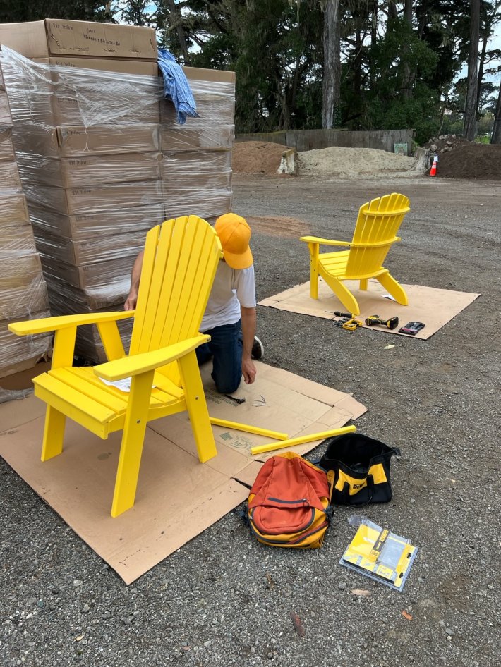 Yellow chairs getting prepped for the JFK Promenade. Photo: Ben Davies