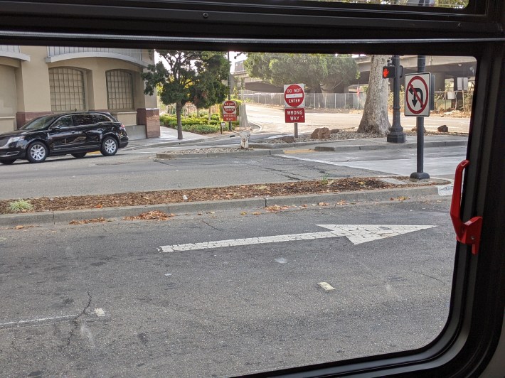 View from the bus of one of the dangerous slip turns from 880 to Broadway that will be closed under the Broadway Corridor plan. Photo: Streetsblog/Rudick