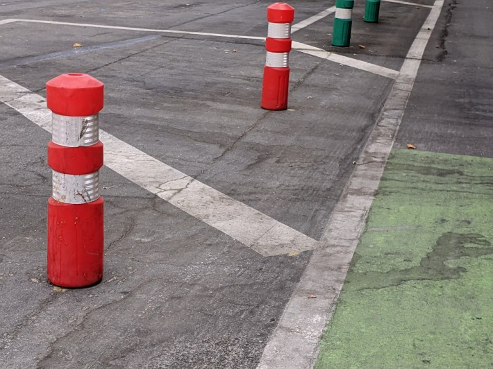 Here the city replaced green posts with orange ones