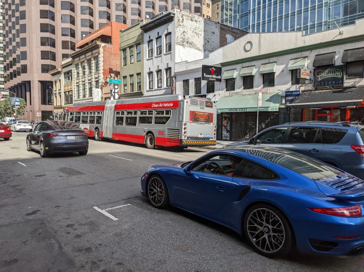 The 8 Bus crawls along Kearny. These 50 bus riders shouldn’t be slowed down by a few folks in private vehicles.