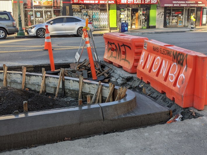 A look at forms setting with newly poured concrete northbound on Telegraph