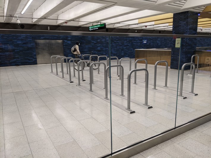 Glass replaced steel around the escalators and bike storage
