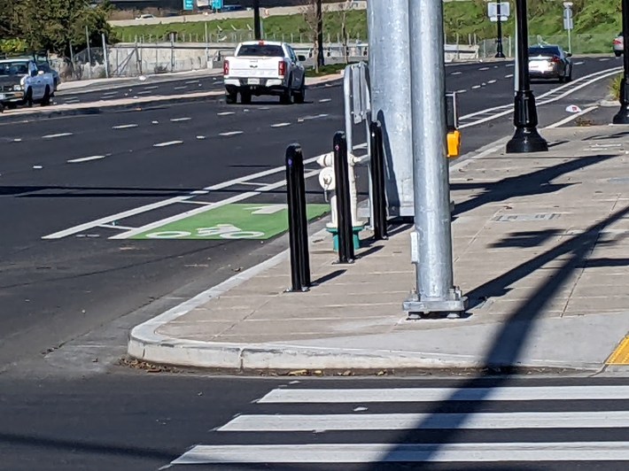 Oh look, a mast pole in the middle of the sidewalk.