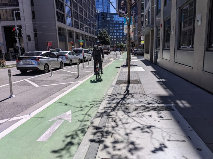 The scene outside city hall, just prior to the meeting. This is the spot where Lovisa Svallingson was killed in 2021, on another project that SFMTA was supposed to "iterate"