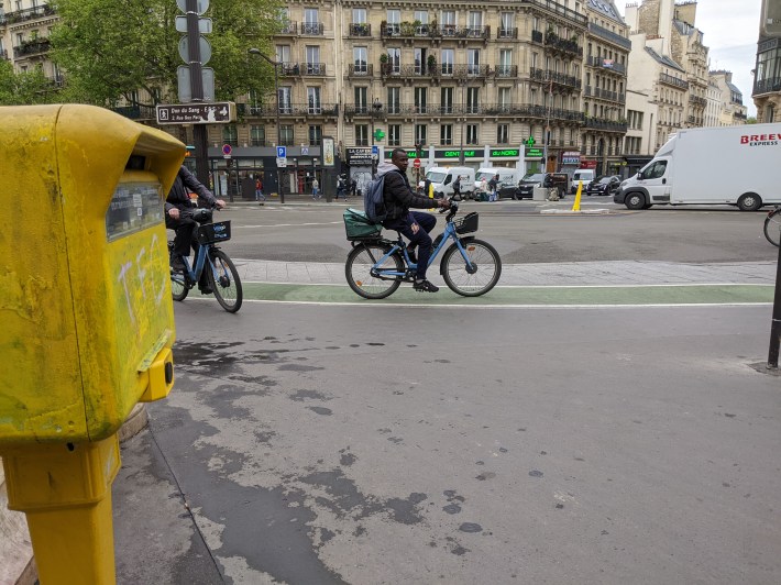 A cyclist on new infrastructure somewhere in the 13th.