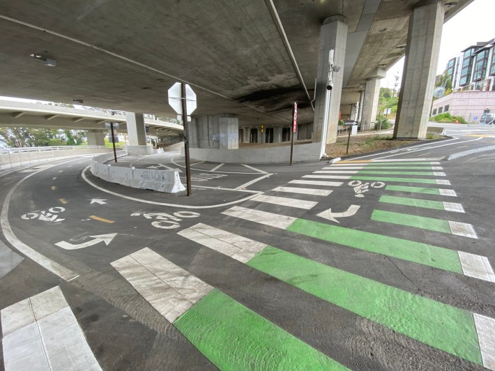 It's well marked, but get a few bike riders out here and... it's confusing. To the right, up the hill, the two directions switch places. Photo: Melanie Curry/Streetsblog