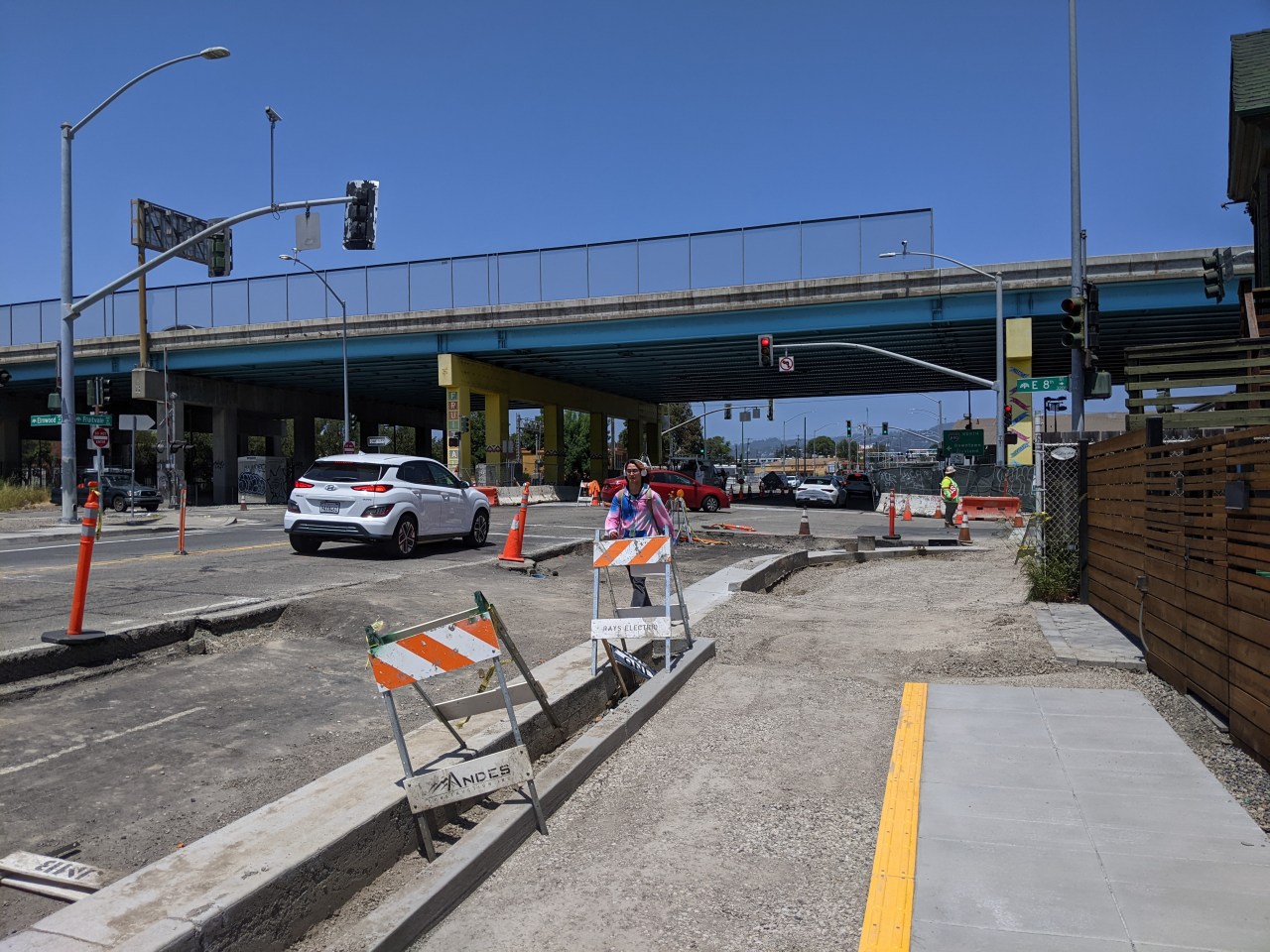 A sidewalk level protected bike lane, going in. Photo: Streetsblog/Rudick